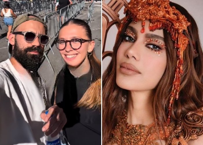 Anitta em performance de show interagindo com o público