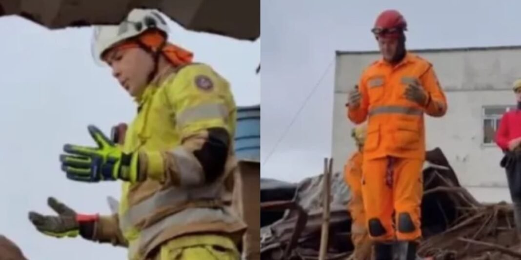 Bombeiros em ação de busca por vítimas soterradas em Juiz de Fora, MG, após fortes chuvas e deslizamentos.