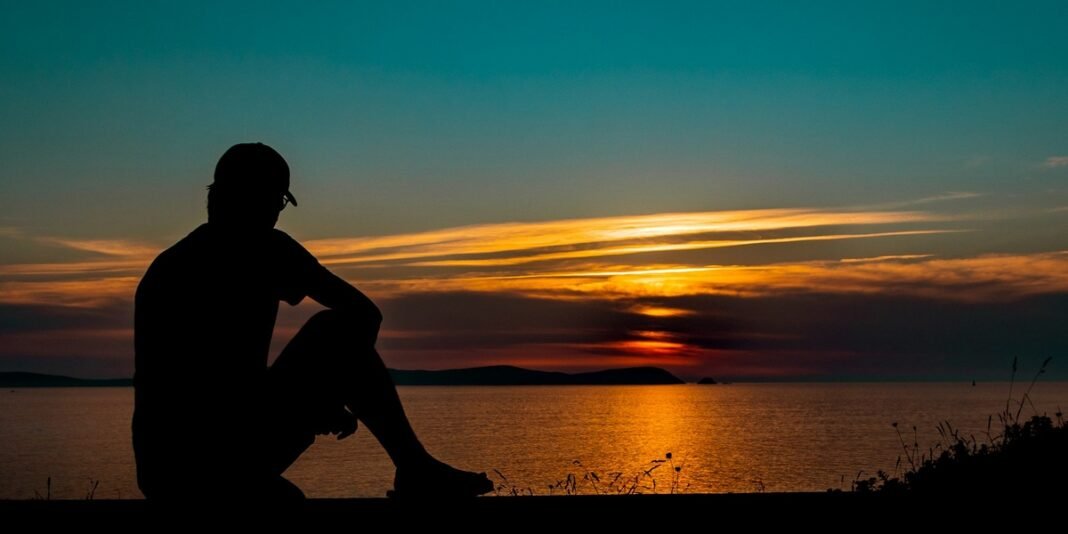 Pessoa em oração e reflexão durante jejum