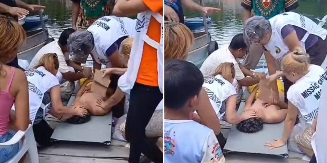 Equipe missionária e médica em ação no Marajó orando por jovem após parada cardíaca.