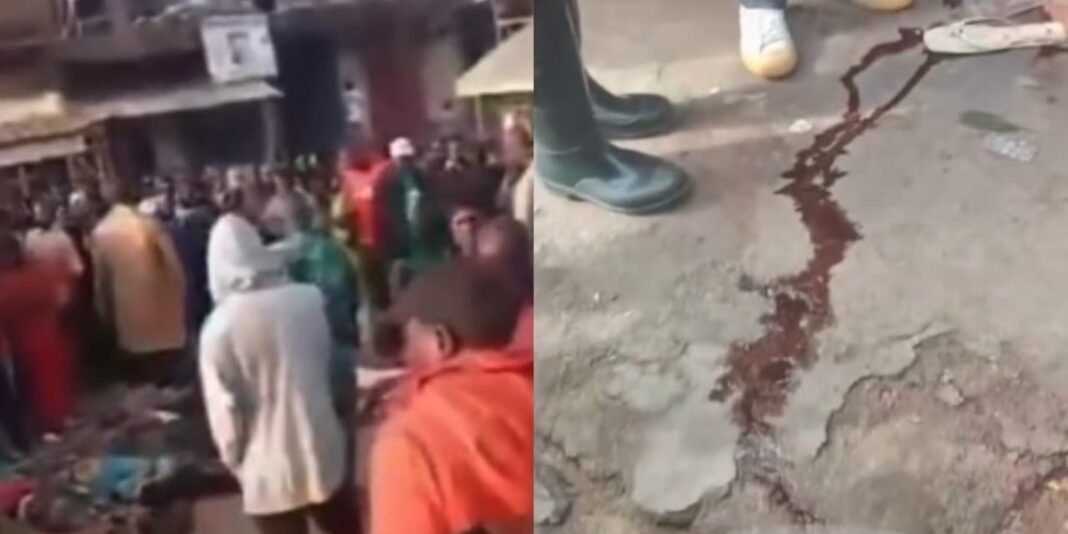 Rua em Jos, Nigéria, com corpos e sinais de destruição após ataque violento no Domingo de Ramos.