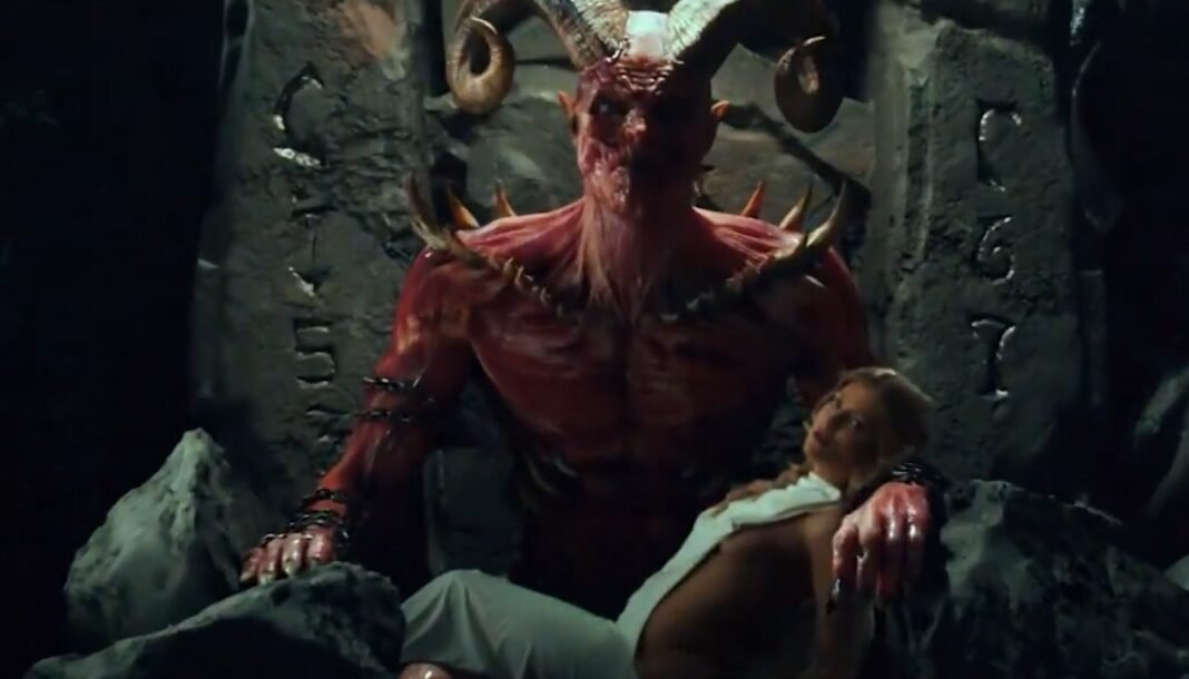 Influenciadora Bella Falconi em alerta sobre simbolismo em clipe musical.