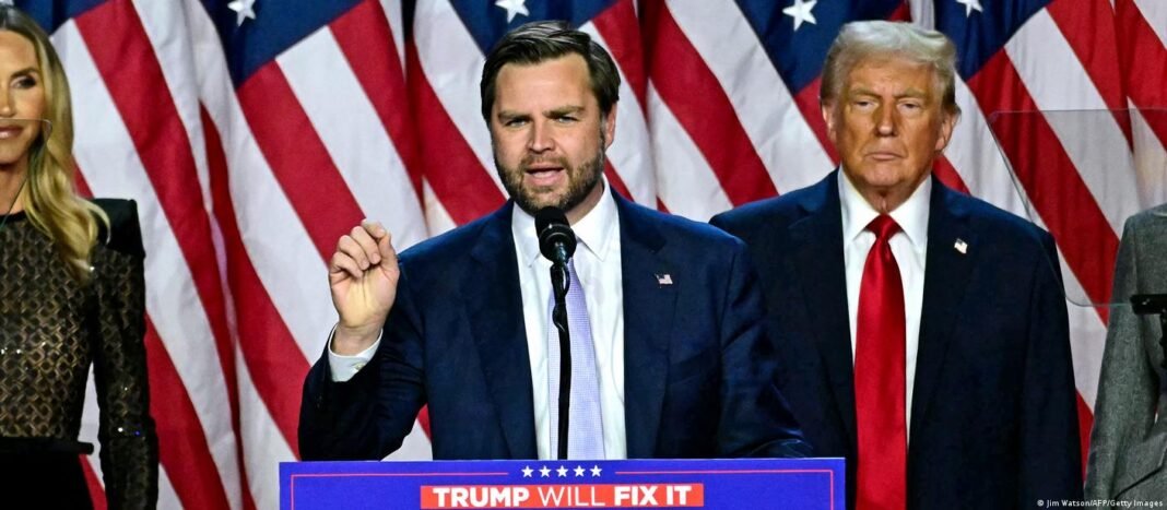 Vice-presidente dos EUA J. D. Vance em sala de reunião com ar sério.