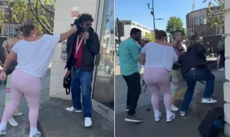 Evangelista John Thomas sendo confrontado por uma mulher durante pregação em Londres.