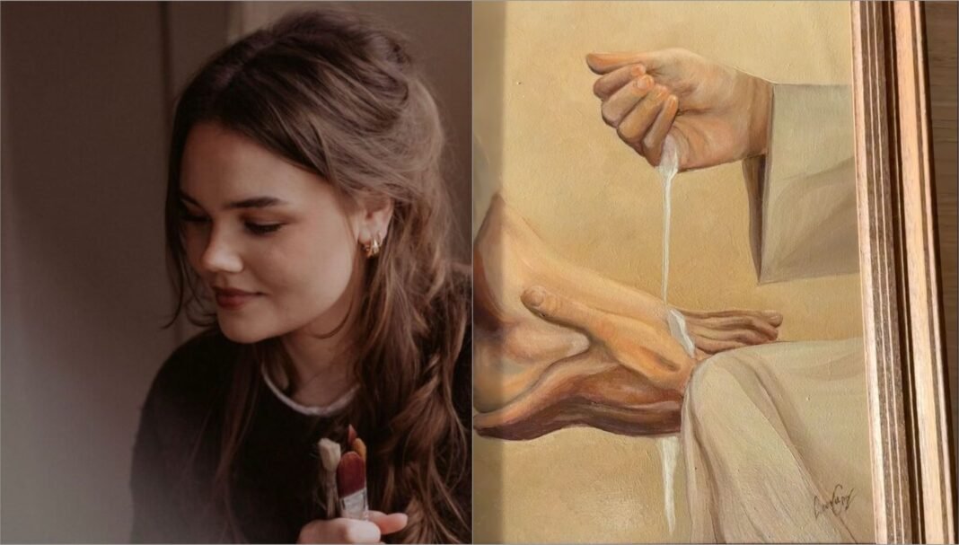 Artista cristã Leonie Gort pintando uma obra com inspiração bíblica em seu ateliê.