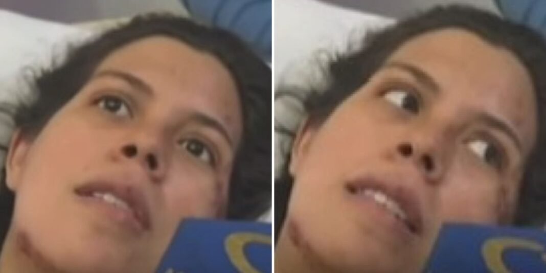Mãe e bebê venezuelanos resgatados após terremoto segurando uma Bíblia.