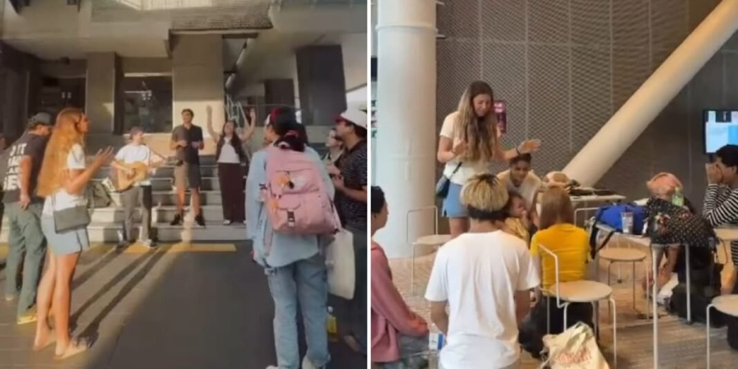 Jovens brasileiros evangelizando estudantes em universidade no Japão