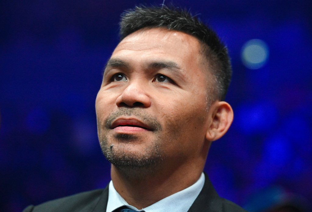 Manny Pacquiao discursando para cristãos na conferência Arise Asia 2026 nas Filipinas.