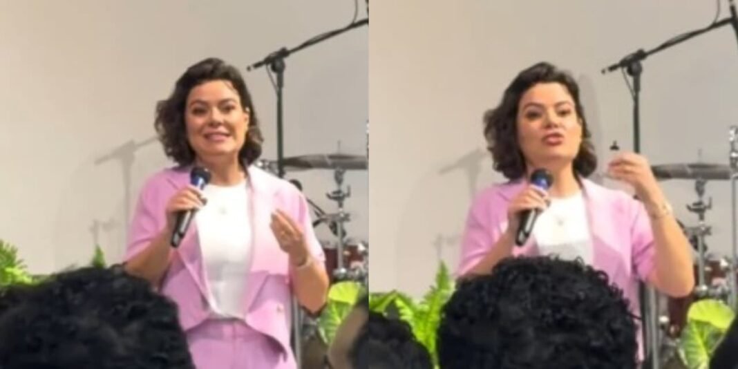 Ana Paula Valadão discursando em um evento de louvor, enfatizando a importância do descanso e da família.