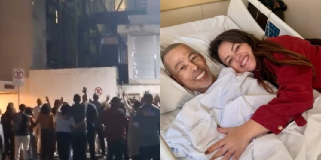 Grupo de cristãos em oração em frente a um hospital por um pastor doente.