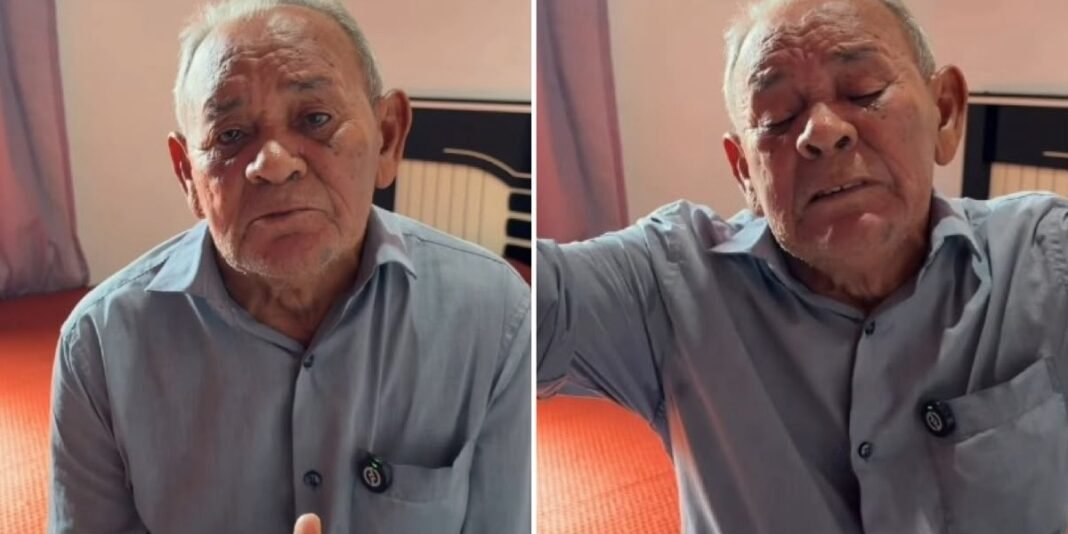 Idoso sentado em poltrona refletindo com expressão serena